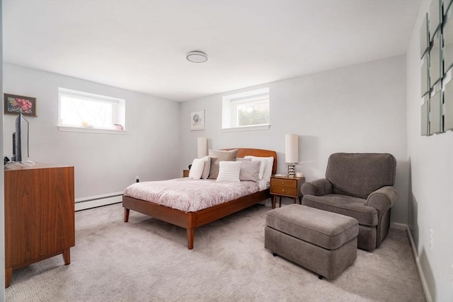 bedroom featuring a baseboard radiator and light carpet