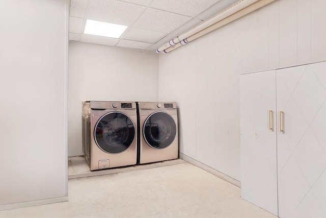 washroom with washer and clothes dryer