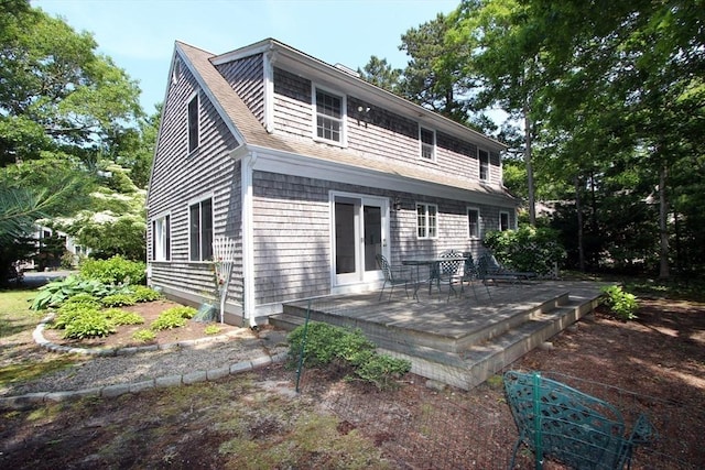 18 Periwinkle Ln, Mashpee, MA 02649 - rear view of property featuring a wooden deck