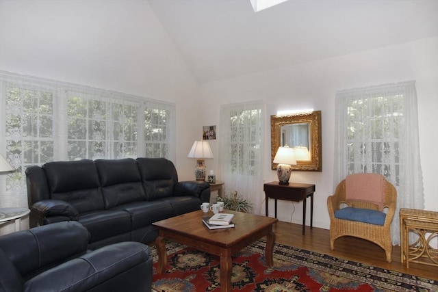 18 Periwinkle Ln, Mashpee, MA 02649 - living area with wood finished floors and high vaulted ceiling