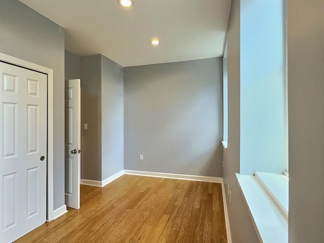 201 Thorndike St Unit 5-01, Lowell, MA 01852 - unfurnished bedroom featuring light wood finished floors and recessed lighting