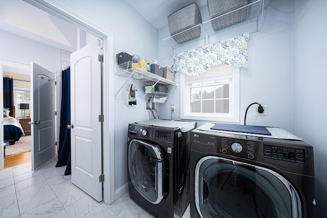 194 Crownshield Ave Unit 194, Uxbridge, MA 01569 - laundry room with washing machine and clothes dryer and light marble finish flooring