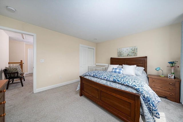 194 Crownshield Ave Unit 194, Uxbridge, MA 01569 - bedroom featuring light colored carpet, a closet, and attic access