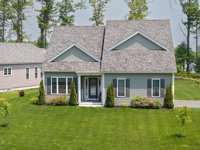 194 Crownshield Ave Unit 194, Uxbridge, MA 01569 - view of front of house with a front lawn and a shingled roof