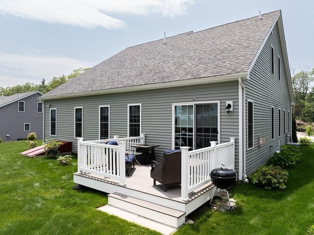 194 Crownshield Ave Unit 194, Uxbridge, MA 01569 - back of property featuring a deck, roof with shingles, and a yard