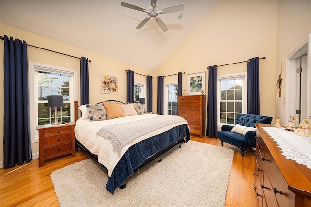 194 Crownshield Ave Unit 194, Uxbridge, MA 01569 - bedroom with high vaulted ceiling, light wood finished floors, multiple windows, and ceiling fan