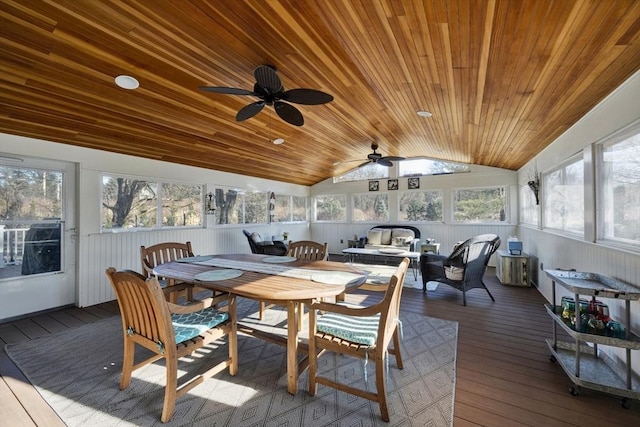 sunroom with vaulted ceiling, wooden ceiling, and ceiling fan