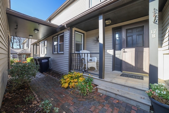 doorway to property with a porch