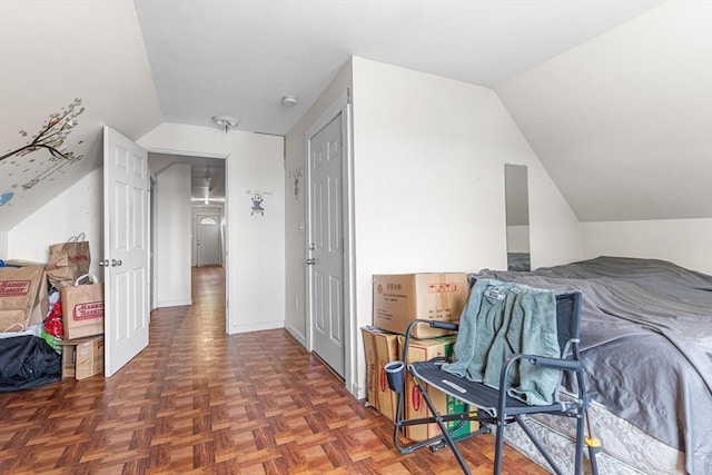 bedroom featuring vaulted ceiling