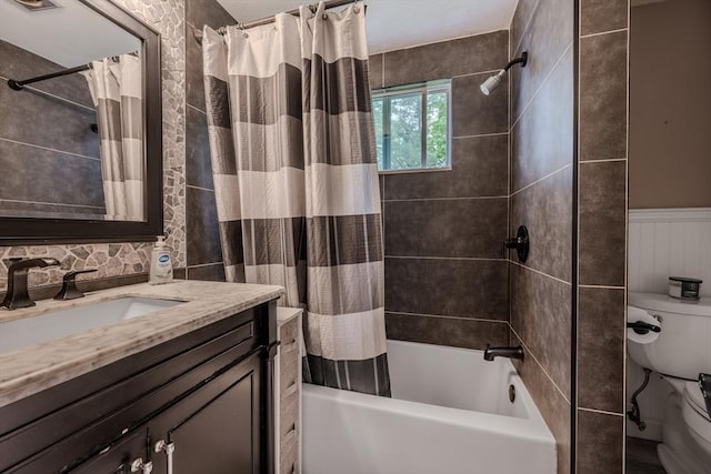 735 Hildreth St, Dracut, MA 01826 - full bathroom with shower / tub combo with curtain, toilet, vanity, and tile walls