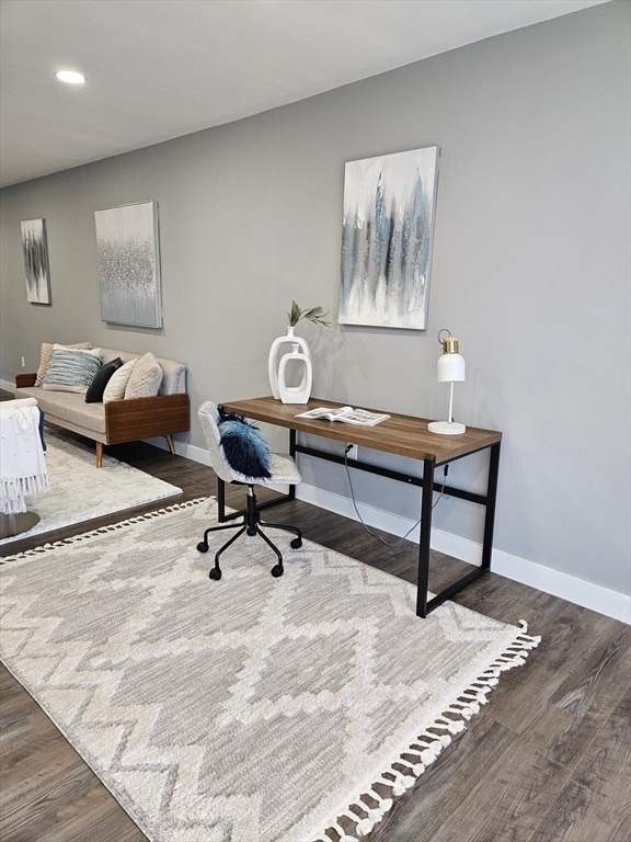 office space featuring dark wood-type flooring