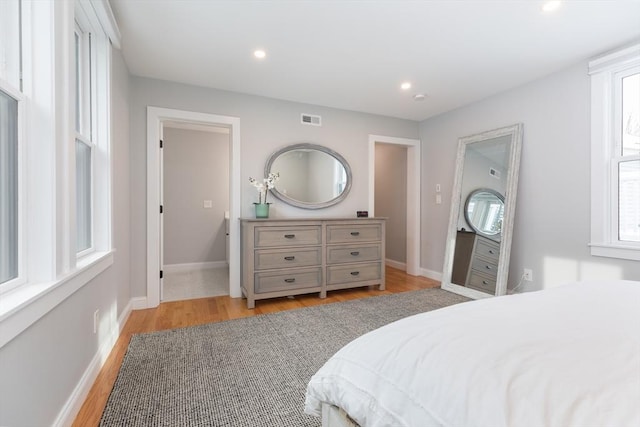 bedroom with light hardwood / wood-style flooring