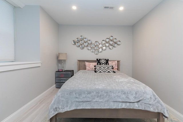 bedroom featuring light hardwood / wood-style flooring