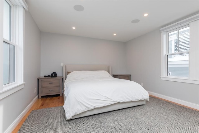 bedroom with light hardwood / wood-style floors