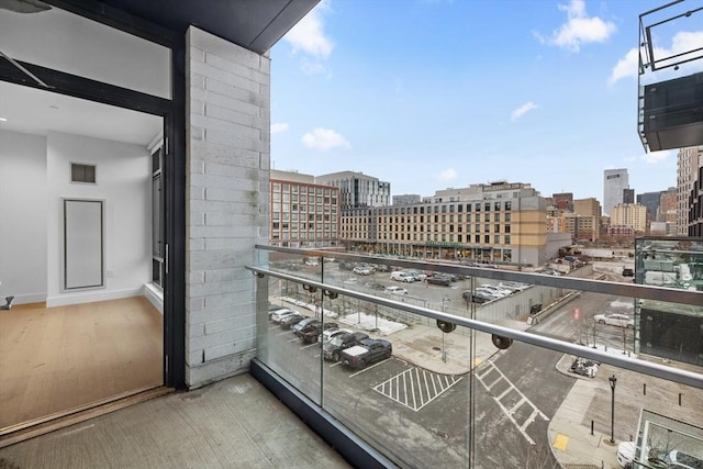 balcony with a city view and visible vents