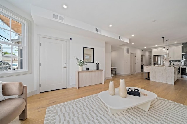 59 Falcon St Unit 1, Boston, MA 02128 - living room featuring light wood-style flooring and recessed lighting