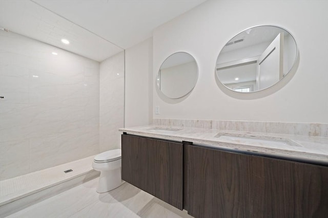 59 Falcon St Unit 1, Boston, MA 02128 - bathroom featuring double vanity and tiled shower