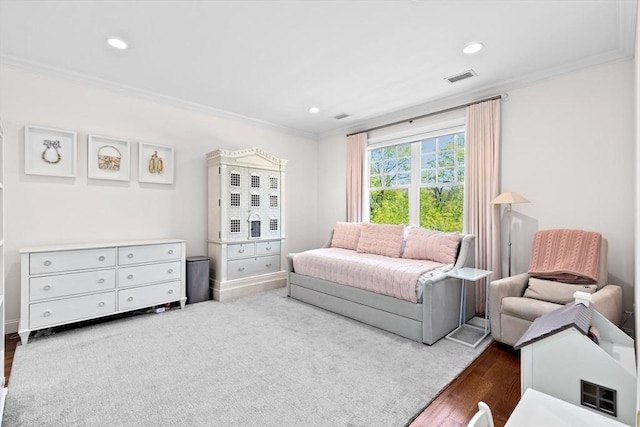 living room featuring crown molding, recessed lighting, and visible vents