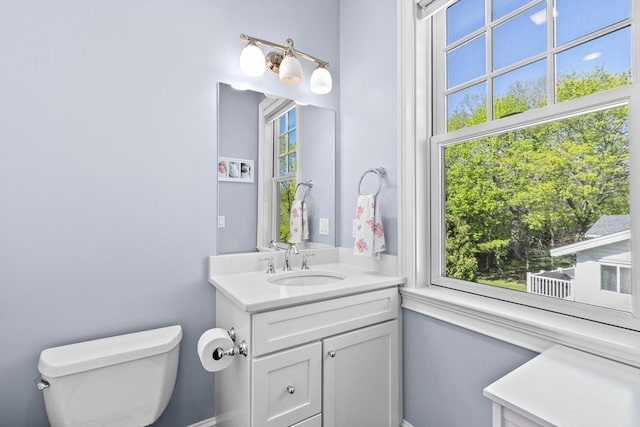 half bath with toilet and vanity