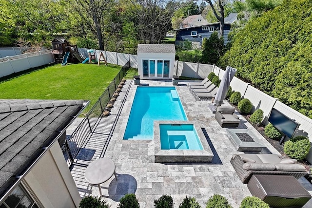 view of pool featuring playground community, a fenced backyard, a patio area, a lawn, and an outdoor structure
