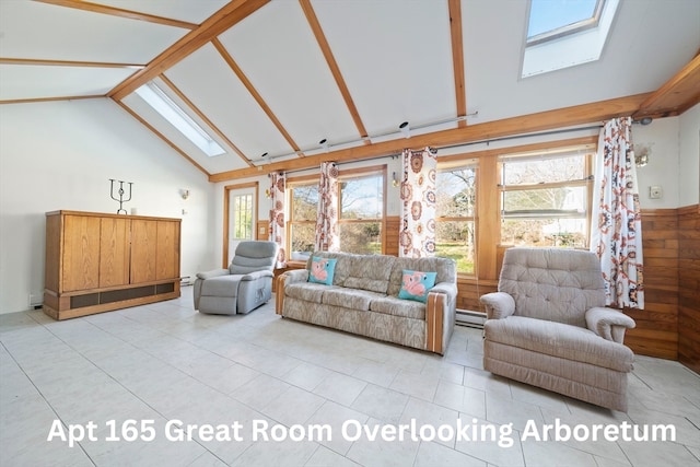 tiled living room featuring a skylight, high vaulted ceiling, a baseboard heating unit, and wood walls