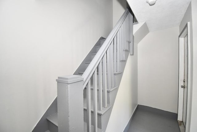 855 Liberty St, Springfield, MA 01104 - staircase featuring baseboards