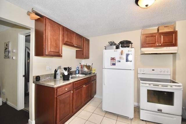 855 Liberty St, Springfield, MA 01104 - kitchen featuring a textured ceiling, white appliances, light tile patterned floors, and under cabinet range hood