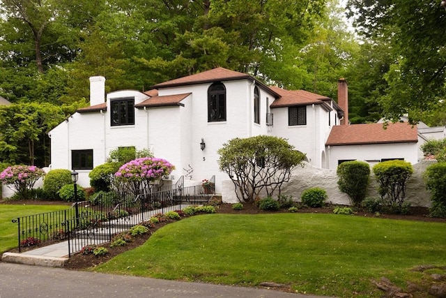 5 Southwick, Newton, MA 02468 - view of front of property with a chimney