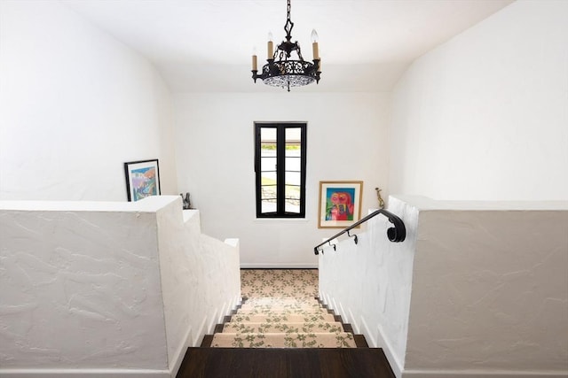 5 Southwick, Newton, MA 02468 - stairs featuring a chandelier, baseboards, and carpet flooring