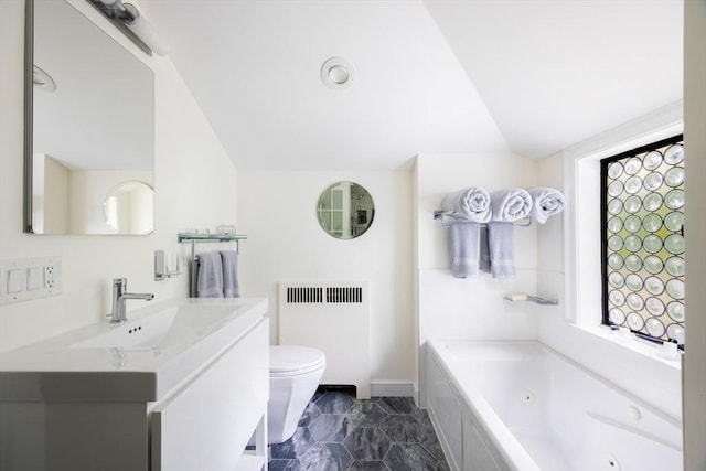 5 Southwick, Newton, MA 02468 - bathroom with radiator heating unit, vanity, a whirlpool tub, lofted ceiling, and toilet