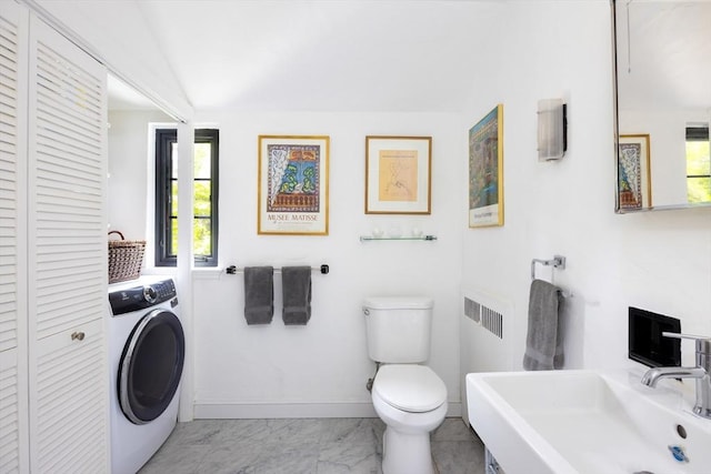 5 Southwick, Newton, MA 02468 - bathroom featuring washer / dryer, a closet, and healthy amount of natural light