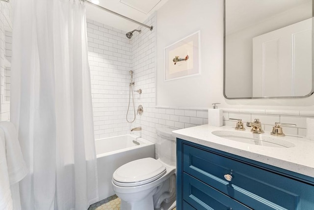 bathroom with toilet, vanity, tile walls, and shower / bath combo with shower curtain