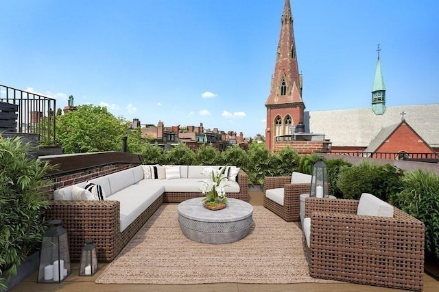 view of patio featuring an outdoor living space with a fireplace