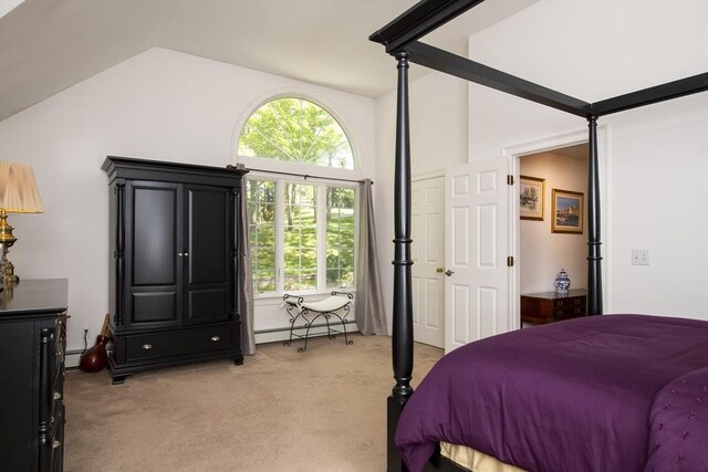 2181 Service Rd, Barnstable, MA 02668 - bedroom with vaulted ceiling, light carpet, and baseboard heating