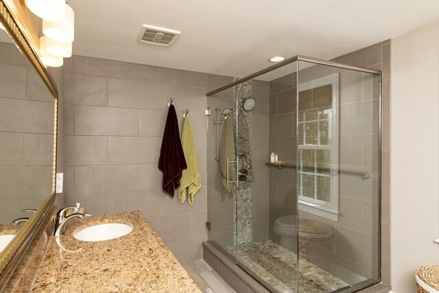 2181 Service Rd, Barnstable, MA 02668 - full bath with vanity, a shower stall, and toilet