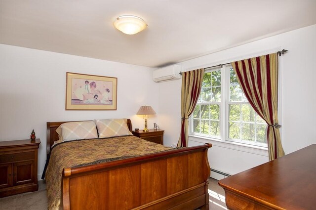 2181 Service Rd, Barnstable, MA 02668 - carpeted bedroom featuring baseboard heating and an AC wall unit