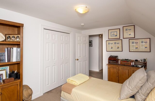 2181 Service Rd, Barnstable, MA 02668 - bedroom featuring carpet floors, a closet, and vaulted ceiling