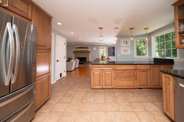 3 Eileen Rd, Norton, MA 02766 - kitchen with appliances with stainless steel finishes, a fireplace, healthy amount of natural light, recessed lighting, and pendant lighting