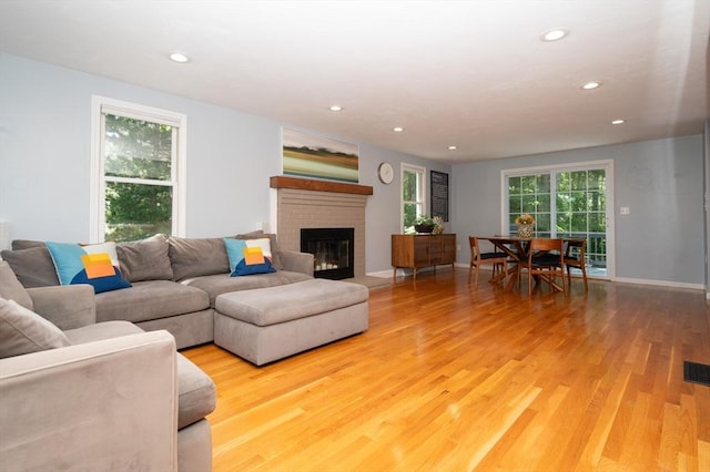 3 Eileen Rd, Norton, MA 02766 - living area with light wood finished floors, recessed lighting, a fireplace, and baseboards