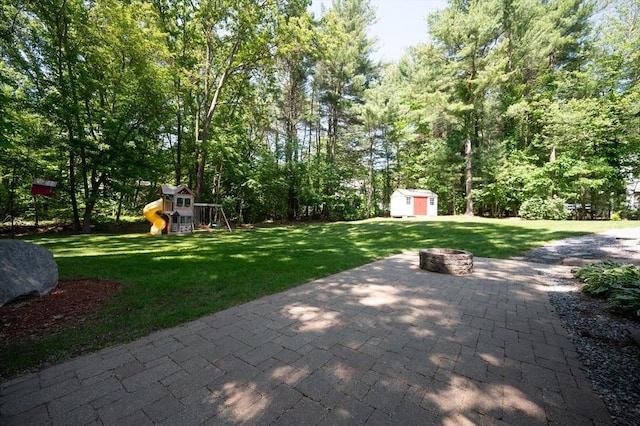 3 Eileen Rd, Norton, MA 02766 - view of patio featuring a playground and an outdoor fire pit