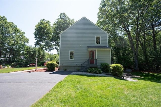 3 Eileen Rd, Norton, MA 02766 - view of front of property with a front lawn and asphalt driveway