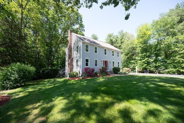 3 Eileen Rd, Norton, MA 02766 - colonial inspired home with a chimney, a front yard, and entry steps