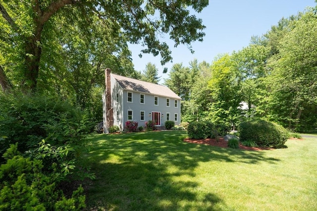 3 Eileen Rd, Norton, MA 02766 - view of front of property with a chimney and a front yard