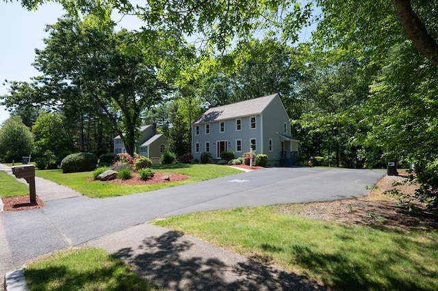 3 Eileen Rd, Norton, MA 02766 - colonial-style house with a front yard and driveway