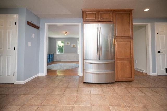 3 Eileen Rd, Norton, MA 02766 - kitchen with freestanding refrigerator, brown cabinetry, baseboards, and recessed lighting
