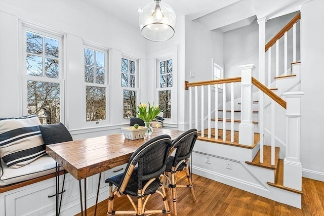 office area featuring light wood finished floors and baseboards