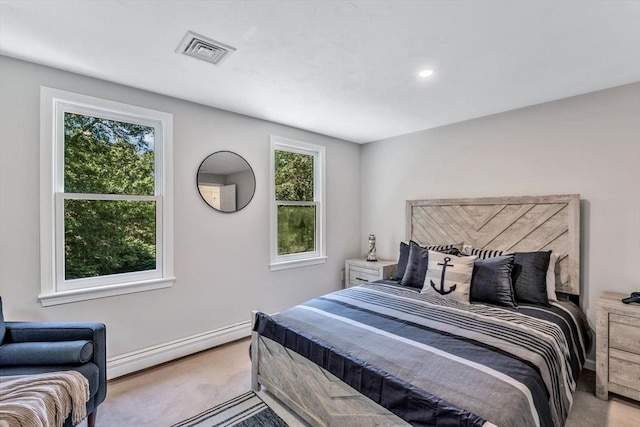 bedroom featuring a baseboard radiator