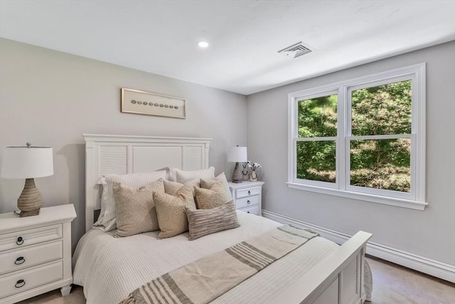 bedroom featuring a baseboard radiator