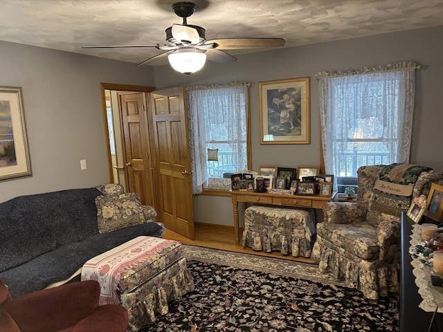 living room with ceiling fan