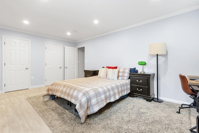 666 Main St Unit 206, Winchester, MA 01890 - bedroom with ornamental molding, wood finished floors, baseboards, recessed lighting, and an office area
